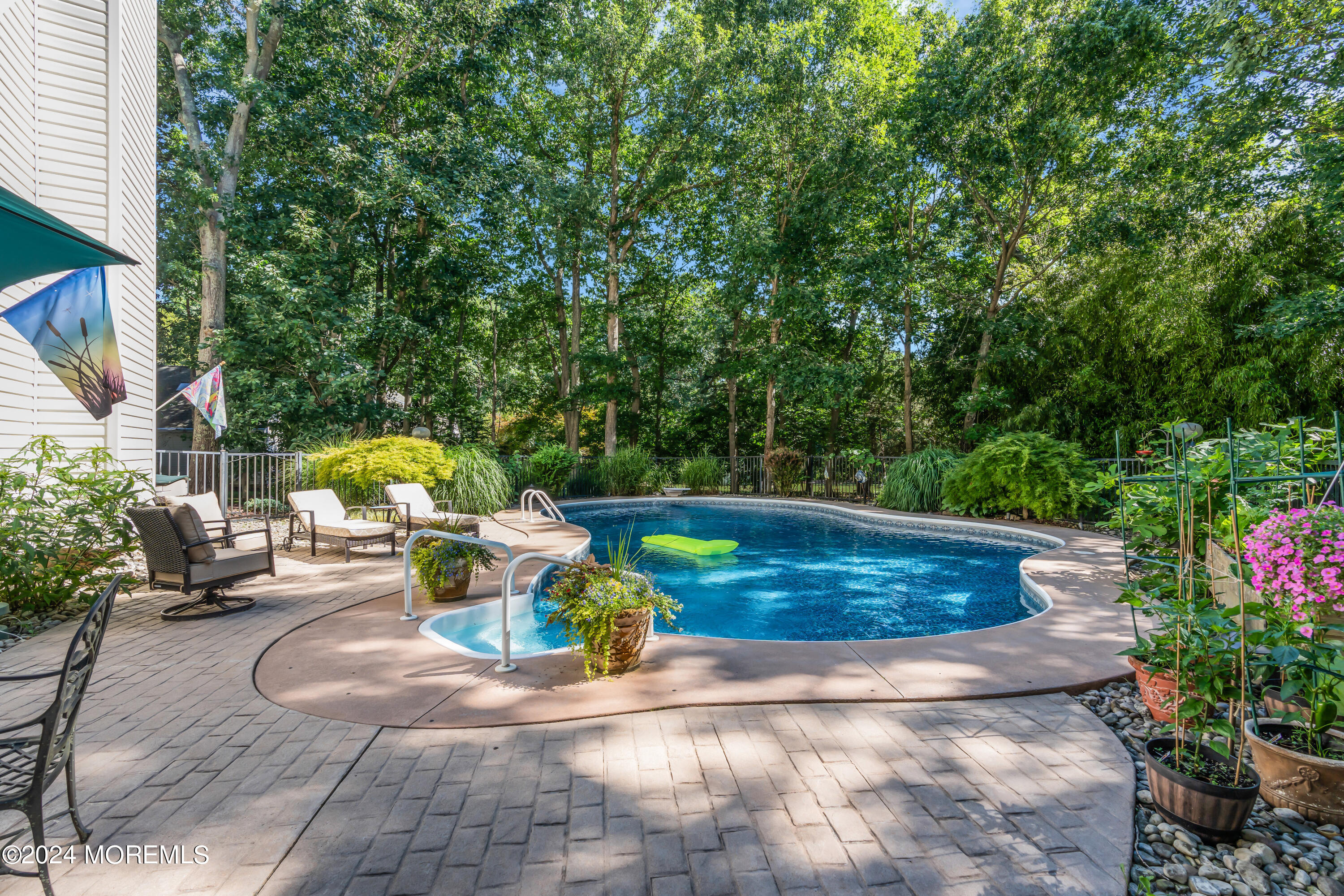 11 Dunhill Road Jackson, NJ 08527 - Photo 73 of 147 a view of a swimming pool with sitting area