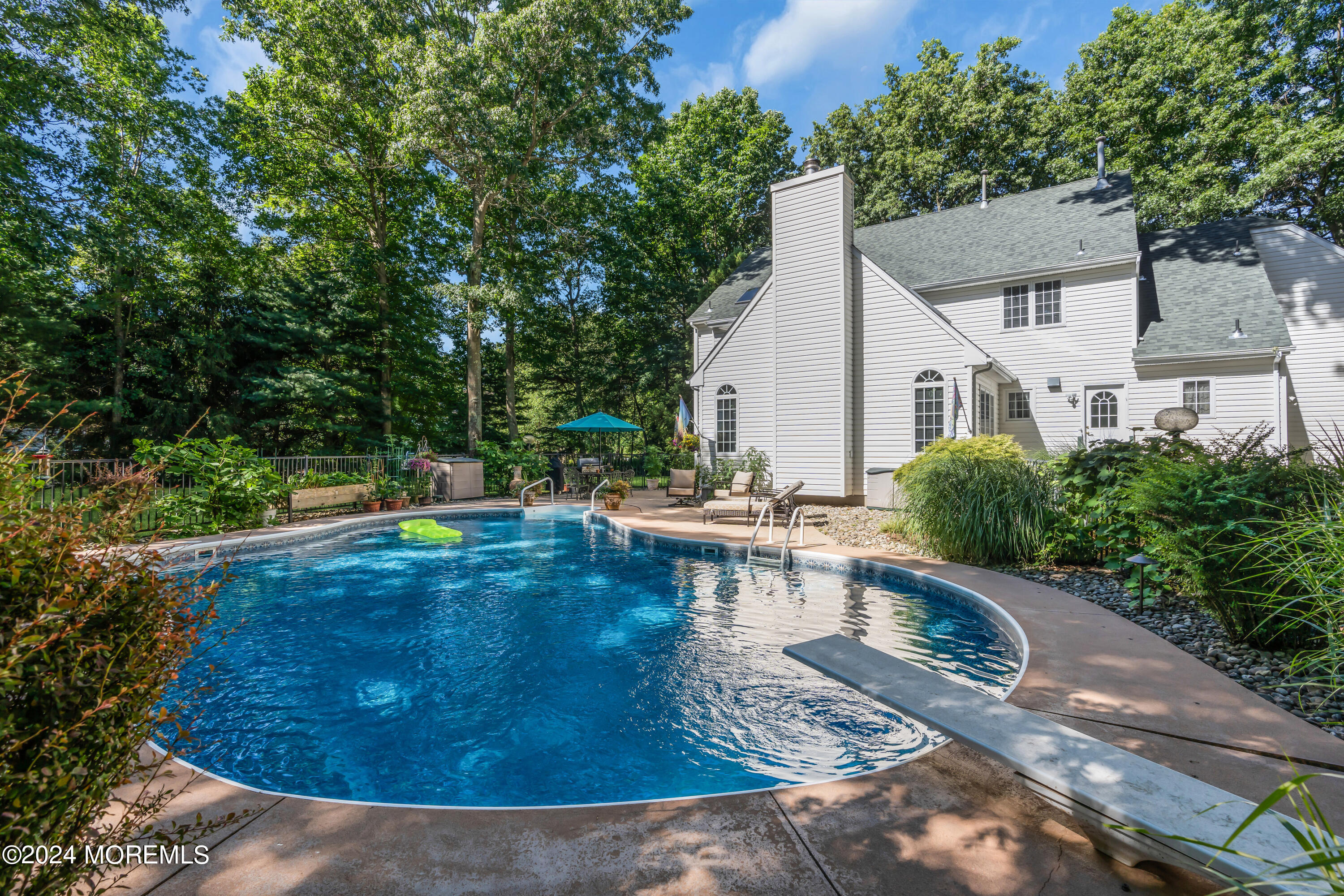 11 Dunhill Road Jackson, NJ 08527 - Photo 74 of 147 a view of a swimming pool with sitting area
