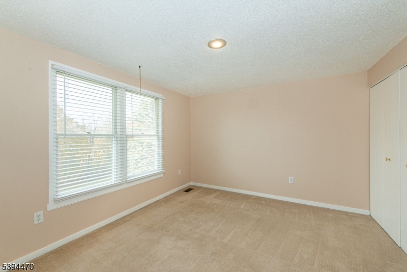 8 Constitution Way Franklin, NJ 07416 - Photo 15 of 26 an empty room with a window