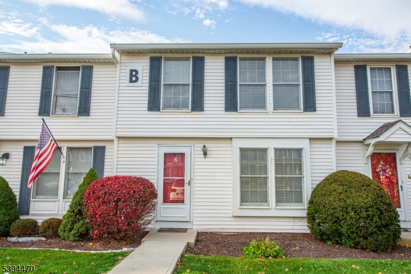 8 Constitution Way Franklin, NJ 07416 - Photo 2 of 26 a front view of a house with garden