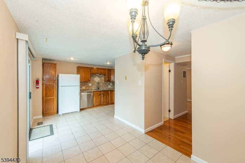 8 Constitution Way Franklin, NJ 07416 - Photo 10 of 26 a view of a bathroom with a sink and a mirror
