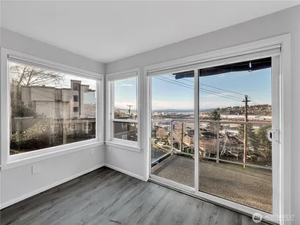 a view of a balcony with city view