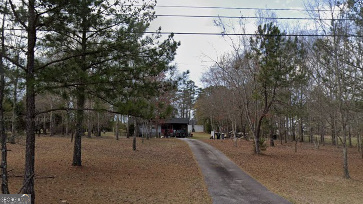 a view of a street with houses