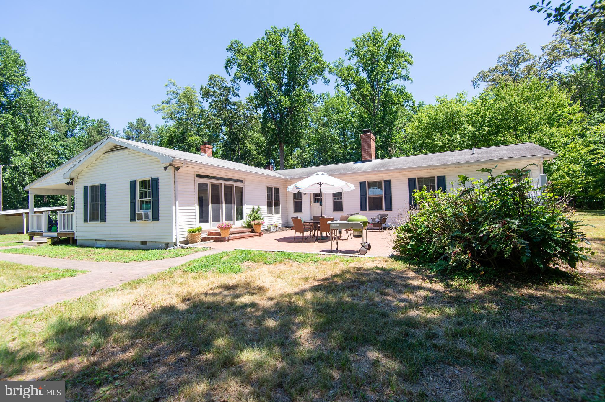 23130 Sparks Road Ridgely, MD 21660 - Photo 1 of 74 a view of a house with backyard porch and sitting area