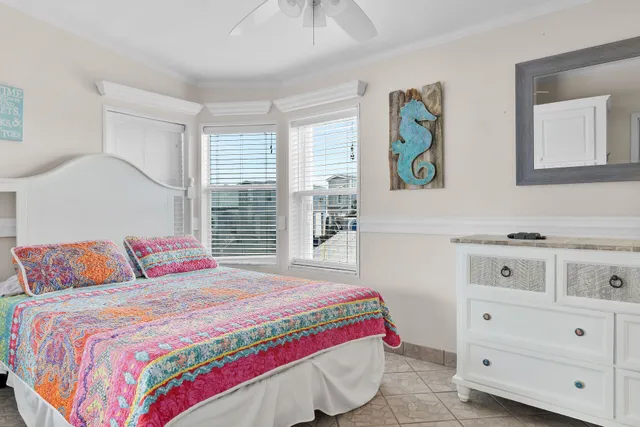 a bedroom with a bed and a cabinets