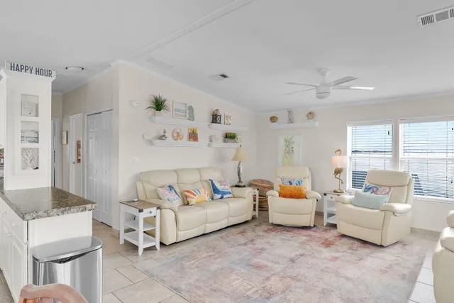 a living room with furniture and a table