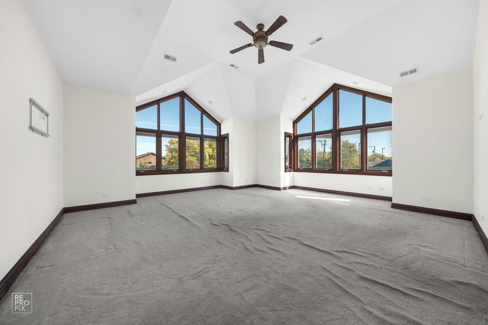 916 Elmdale Road Glenview, IL 60025 - Photo 14 of 20 a view of an empty room with a window