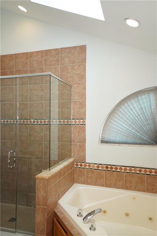 728 Mercer Street Pittsburgh, PA 15219 - Photo 15 of 27 a bathroom with a tub and a shower