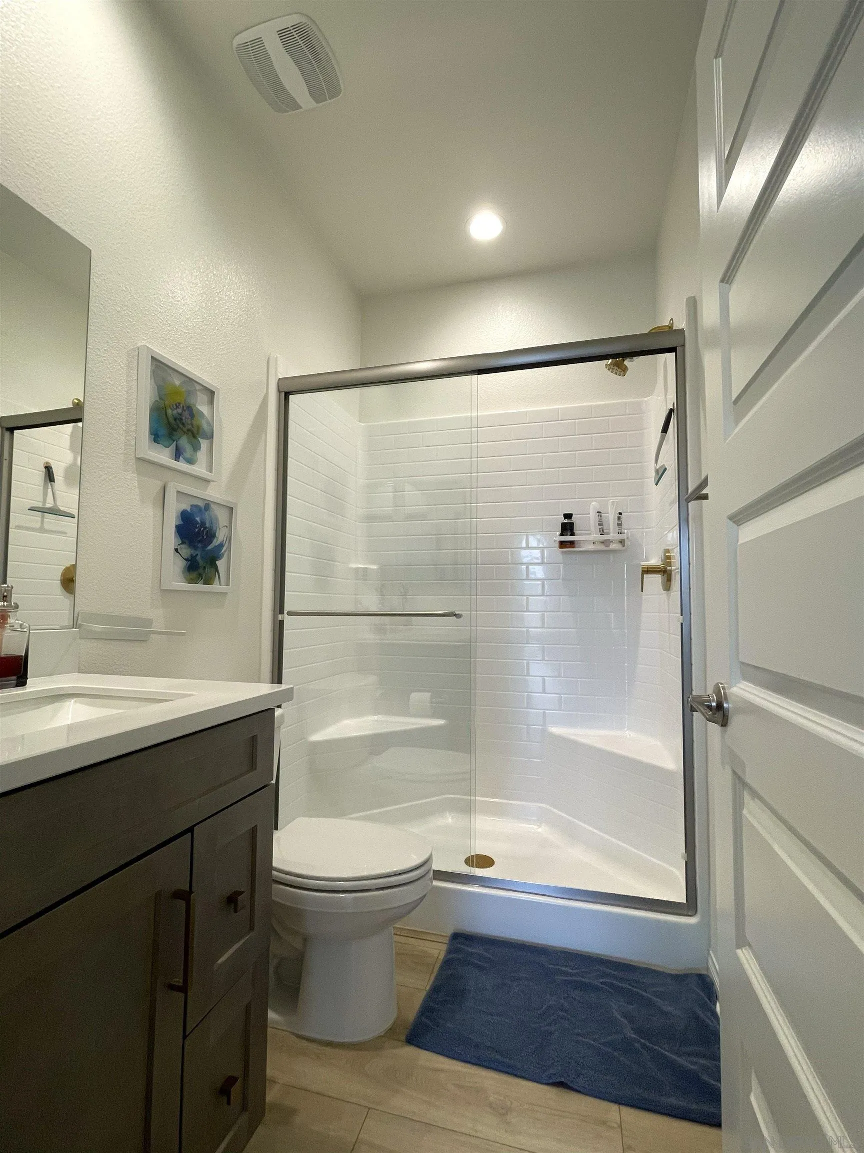 2708 Juniper Berry Street Spring Valley, CA 91977 - Photo 21 of 39 a bathroom with a granite countertop sink toilet and shower