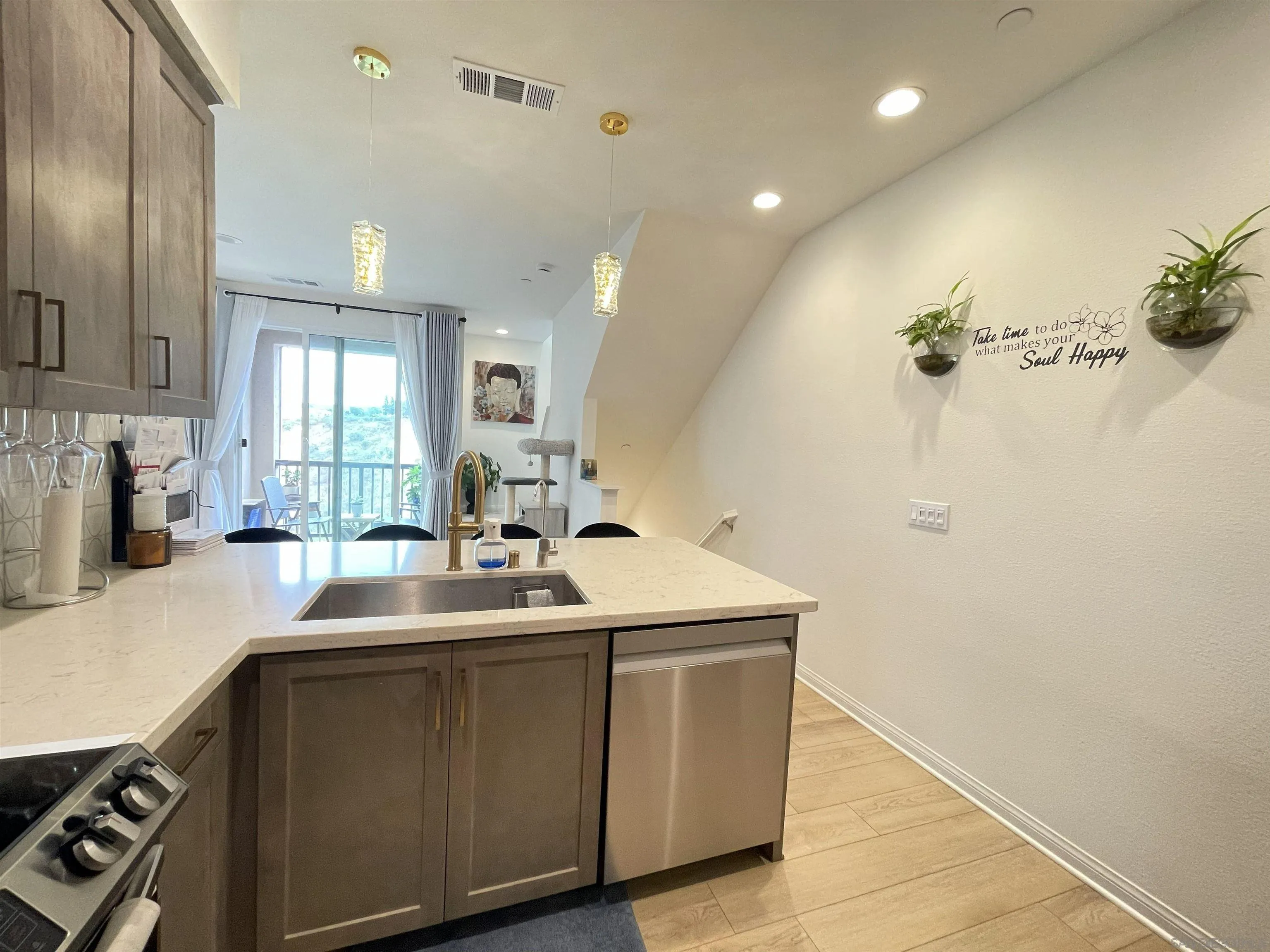 2708 Juniper Berry Street Spring Valley, CA 91977 - Photo 24 of 39 a kitchen with sink a refrigerator and cabinets