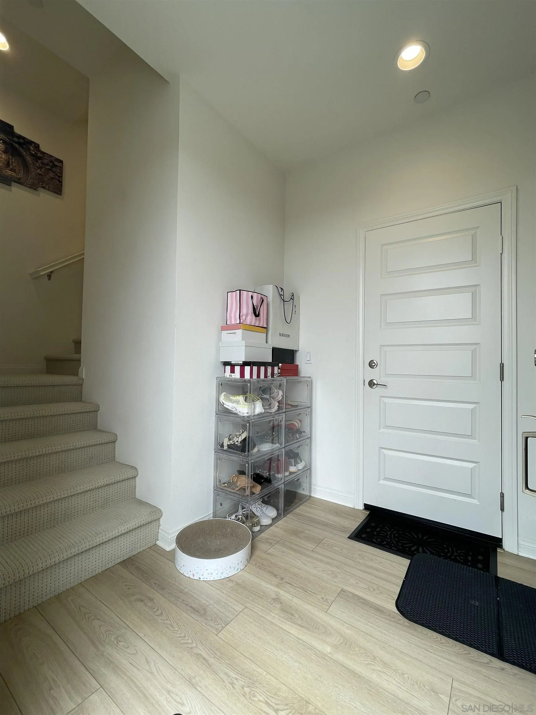 2708 Juniper Berry Street Spring Valley, CA 91977 - Photo 31 of 39 a room with stairs and a furniture