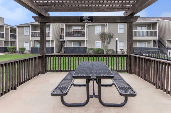a view of a kitchen with washer and dryer
