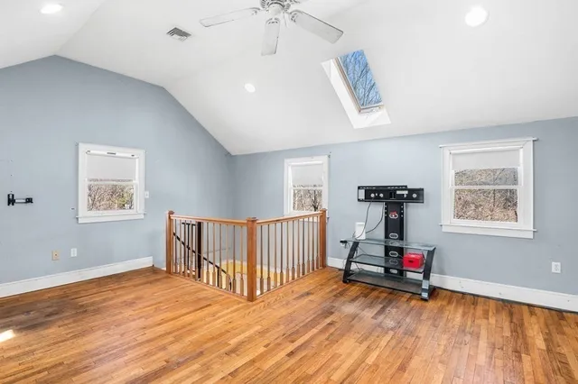 a view of livingroom with furniture and workspace