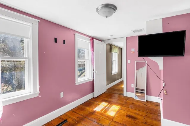 a view of livingroom with furniture and a flat screen tv