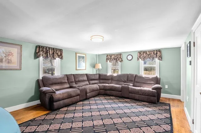 a living room with furniture and a couch