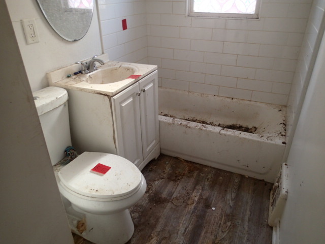 3404 North Neva Avenue Chicago, IL 60634 - Photo 4 of 8 a bathroom with a sink and a toilet