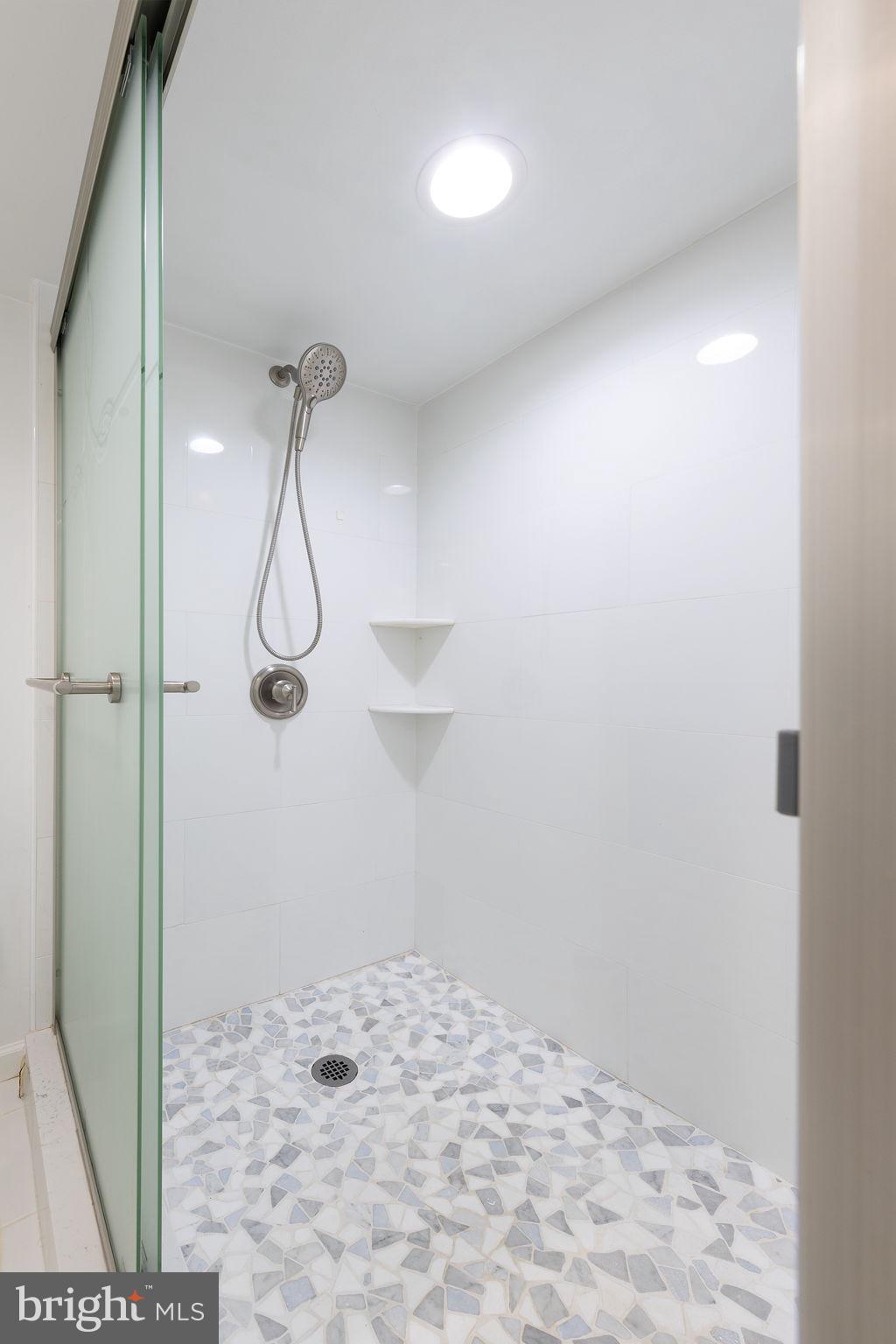 12112 Atherton Drive Silver Spring, MD 20902 - Photo 11 of 32 a bathroom with a shower