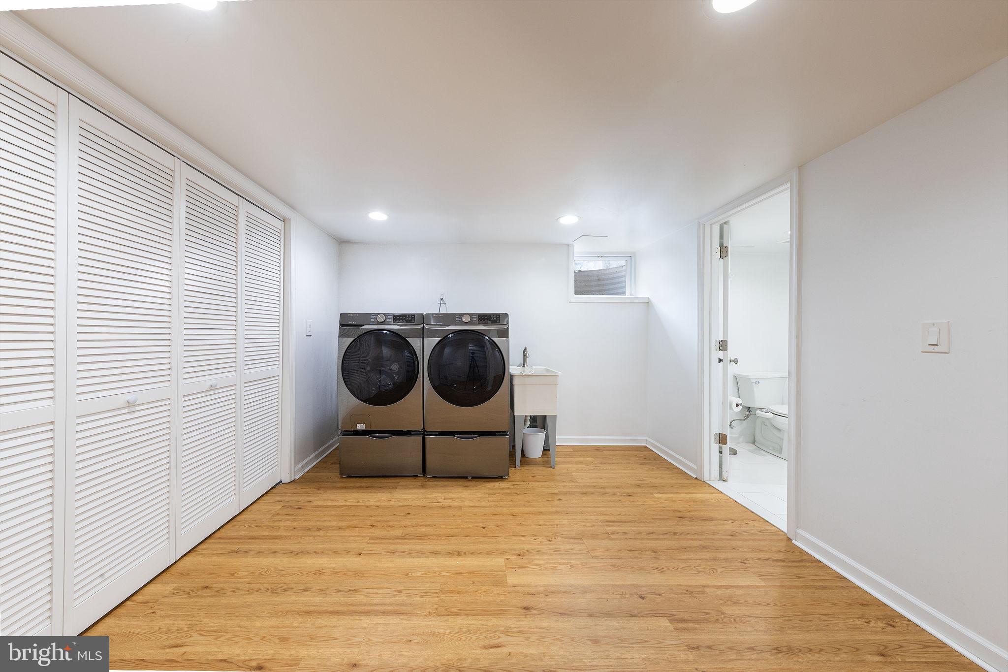 12112 Atherton Drive Silver Spring, MD 20902 - Photo 14 of 32 a bedroom with a bed and a window