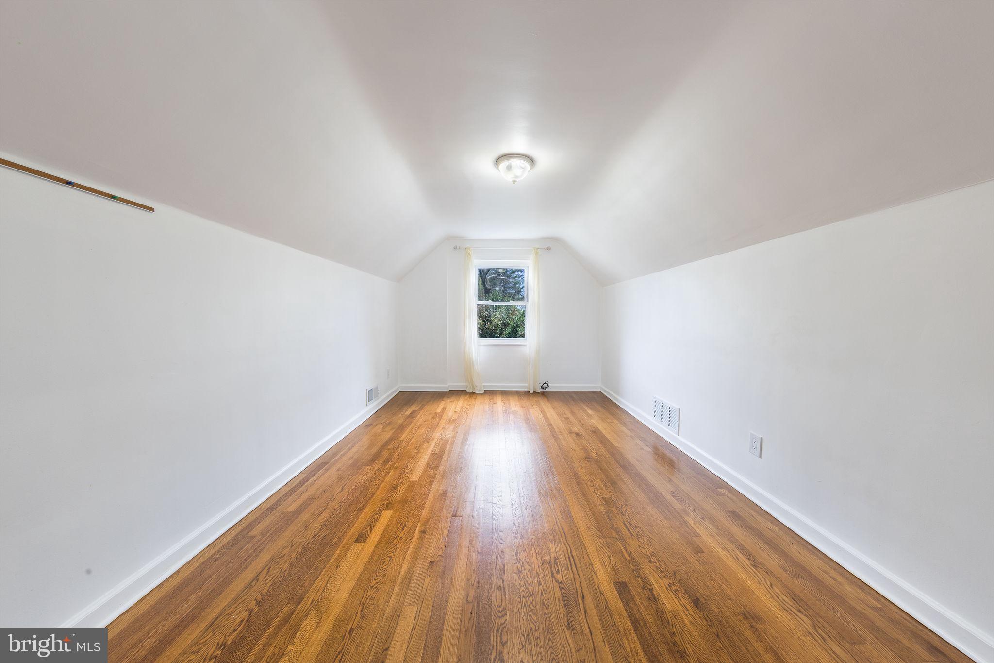 12112 Atherton Drive Silver Spring, MD 20902 - Photo 20 of 32 wooden floor in a empty room