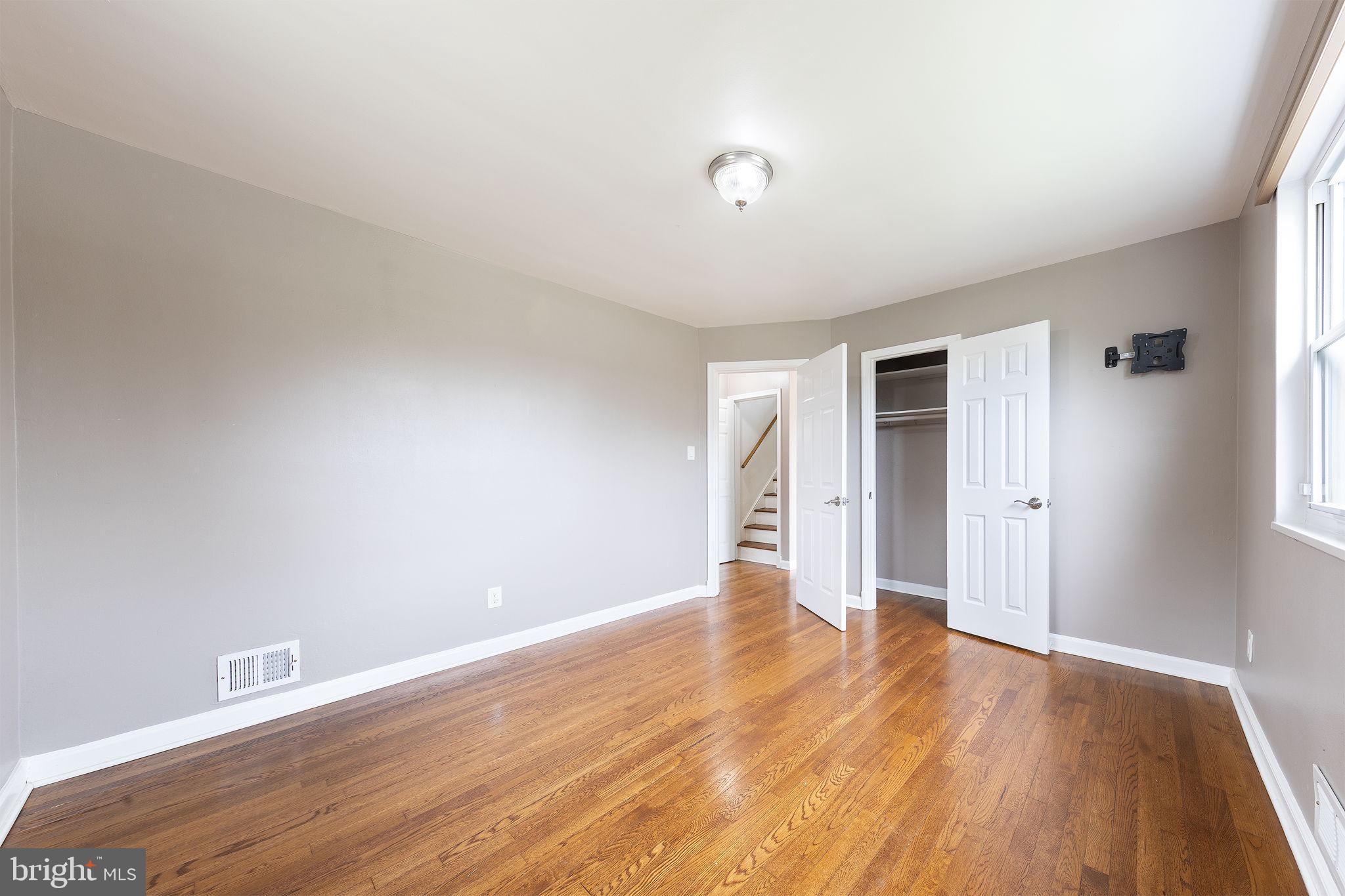 12112 Atherton Drive Silver Spring, MD 20902 - Photo 24 of 32 wooden floor in an empty room
