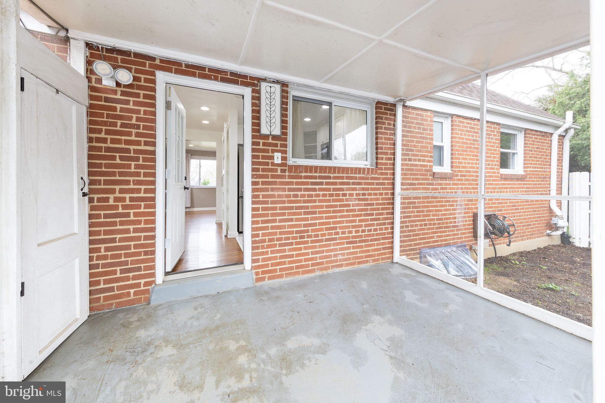 12112 Atherton Drive Silver Spring, MD 20902 - Photo 28 of 32 a view of a house with an empty space and balcony