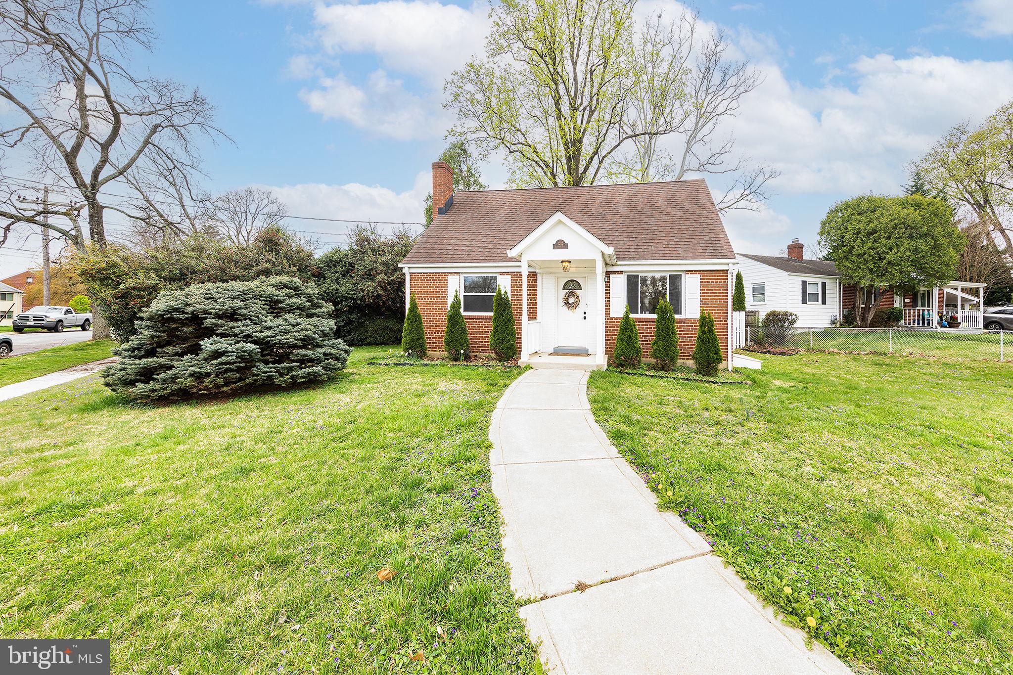12112 Atherton Drive Silver Spring, MD 20902 - Photo 29 of 32 front view of a house with a yard
