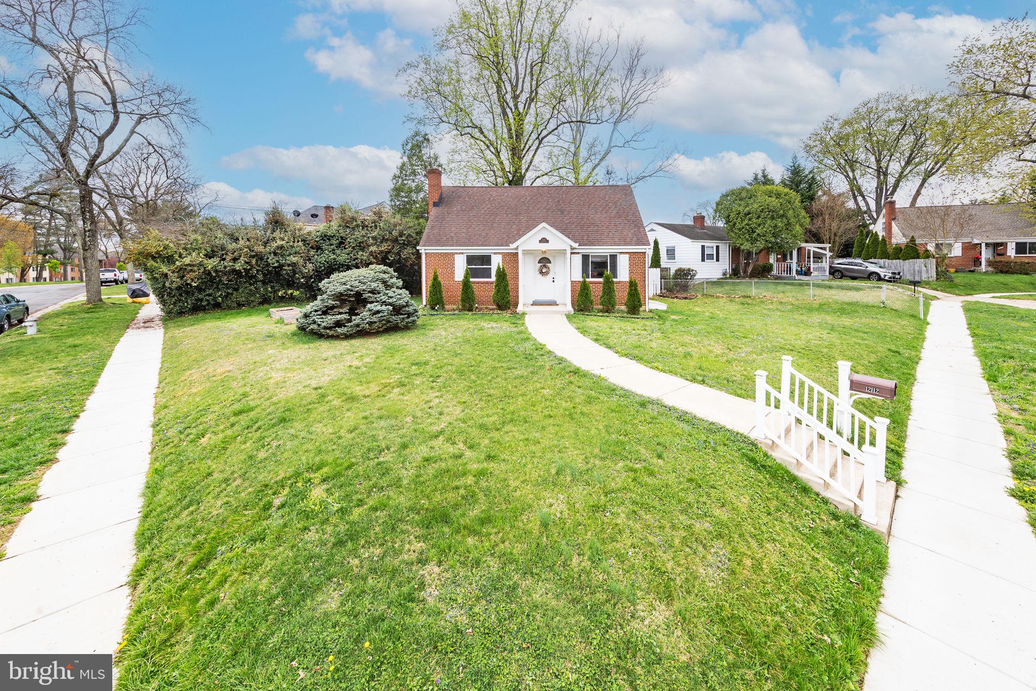 12112 Atherton Drive Silver Spring, MD 20902 - Photo 32 of 32 a view of a house with a big yard