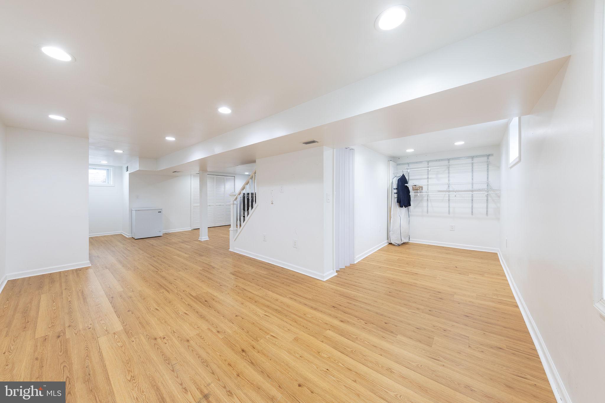 12112 Atherton Drive Silver Spring, MD 20902 - Photo 10 of 32 a view of empty room with wooden floor