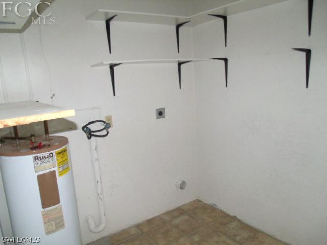 17476 Duquesne Road Fort Myers, FL 33967 - Photo 20 of 23 a view of storage and utility room with a sink