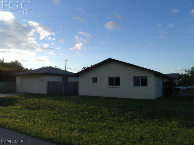 17476 Duquesne Road Fort Myers, FL 33967 - Photo 23 of 23 a house view with a garden space
