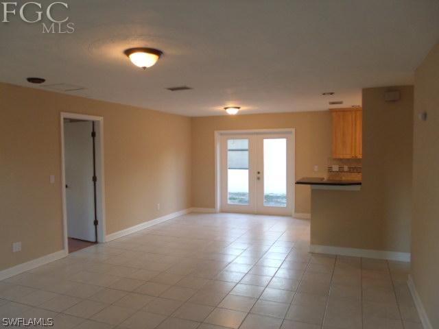 17476 Duquesne Road Fort Myers, FL 33967 - Photo 5 of 23 a view of livingroom with hardwood floor and a window