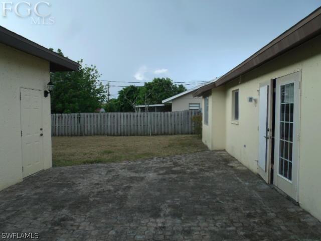 17476 Duquesne Road Fort Myers, FL 33967 - Photo 6 of 23 a view of backyard and deck