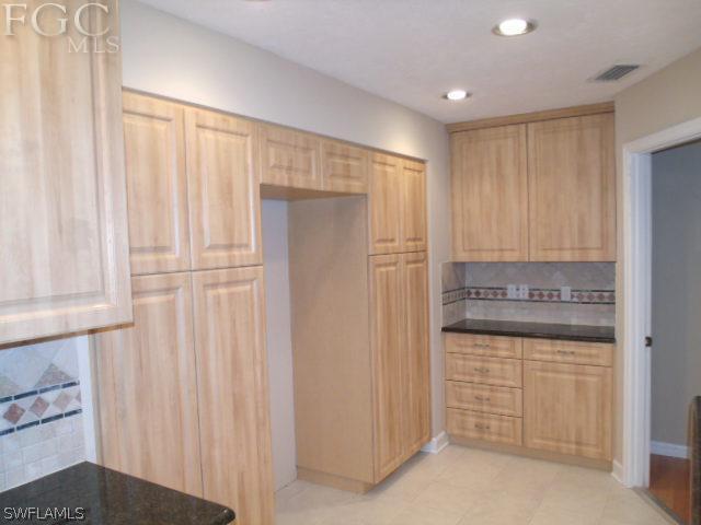 17476 Duquesne Road Fort Myers, FL 33967 - Photo 7 of 23 a bathroom with a shower and a sink