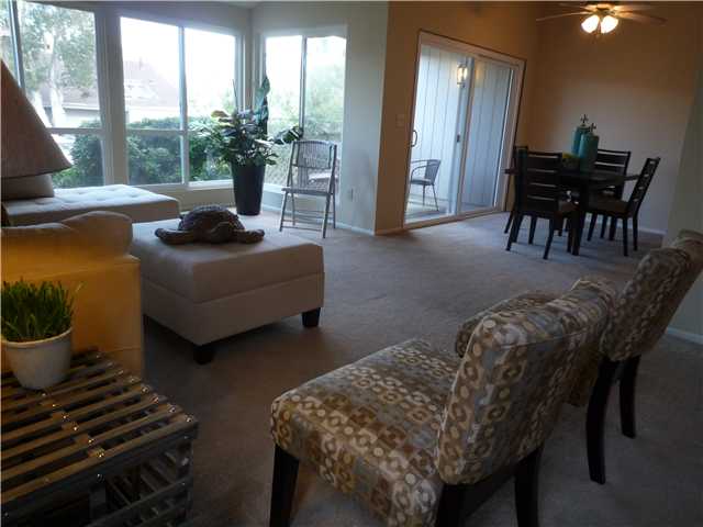 1751 Whitehall Road Encinitas, CA 92024 - Photo 2 of 17 Living room to dining area and patio. All new windows and lots of light!