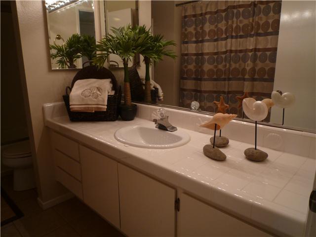 1751 Whitehall Road Encinitas, CA 92024 - Photo 7 of 17 Bathroom with area for washer and dryer. New tub shower enclosure doors.
