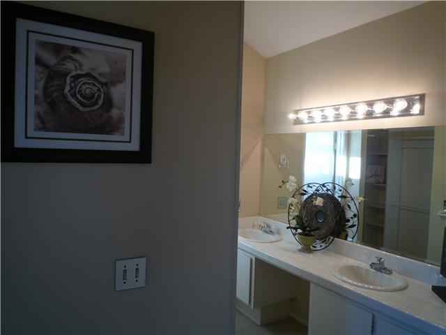 1751 Whitehall Road Encinitas, CA 92024 - Photo 10 of 17 Master bathroom with dual vanities and walk-in closet.