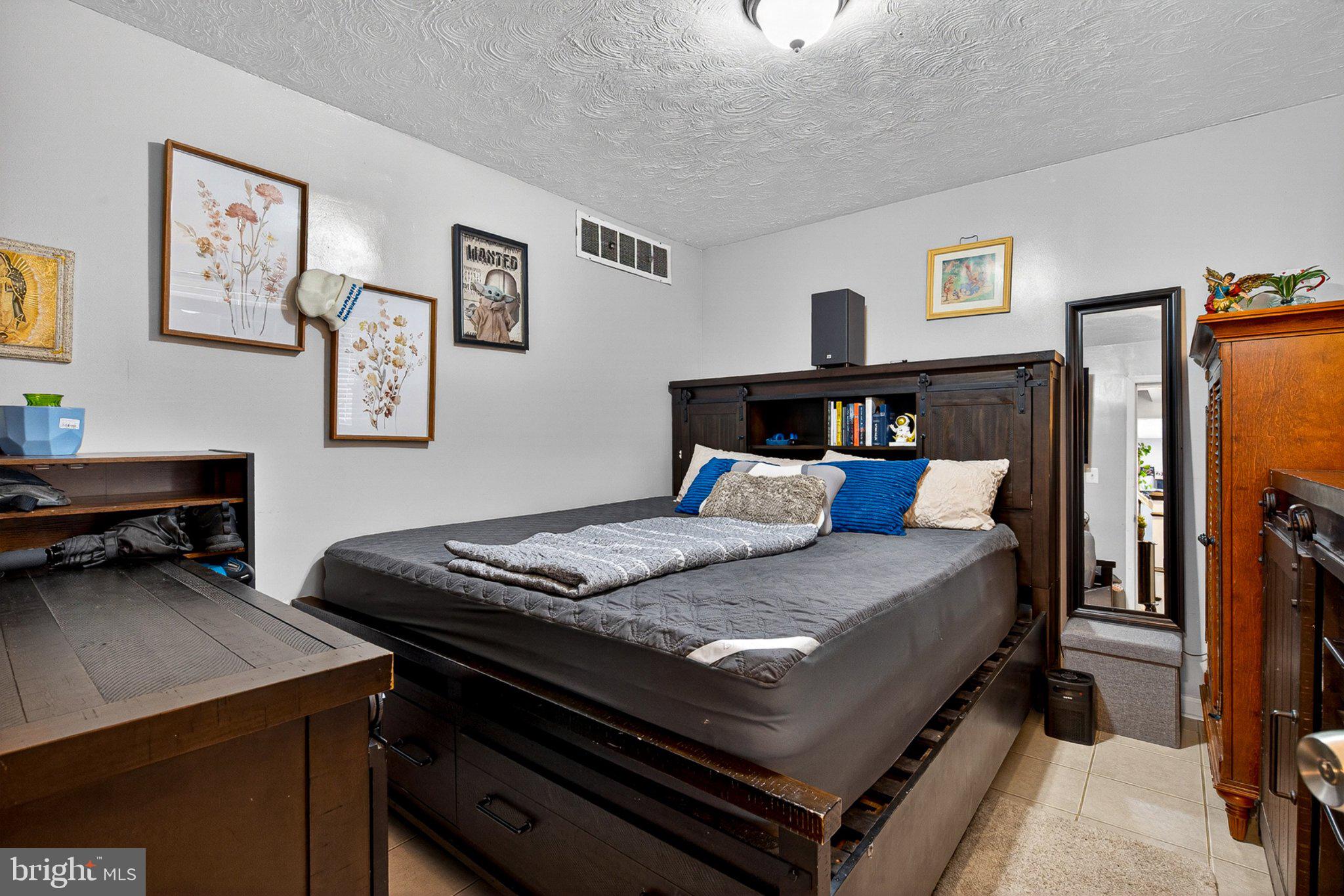 3947 Susanna Road Randallstown, MD 21133 - Photo 44 of 52 Cozy bedroom with charming decor.
