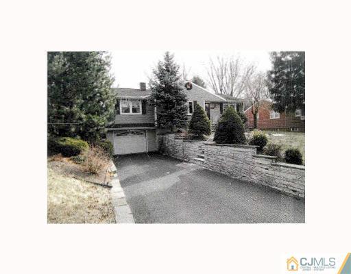 768 Old Raritan Road Edison, NJ 08820 - Photo 1 of 10 a view of a yard in front of the house