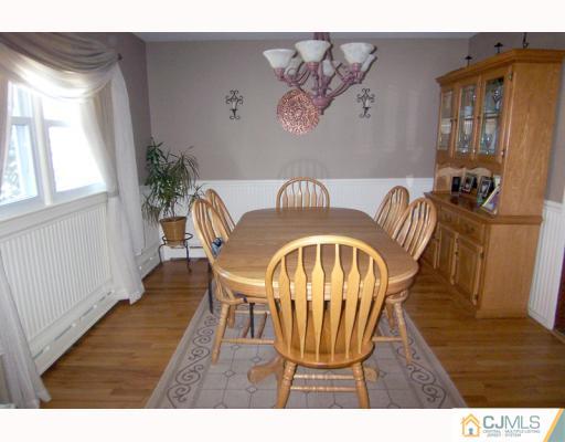 768 Old Raritan Road Edison, NJ 08820 - Photo 3 of 10 a view of a dining room with furniture window and wooden floor