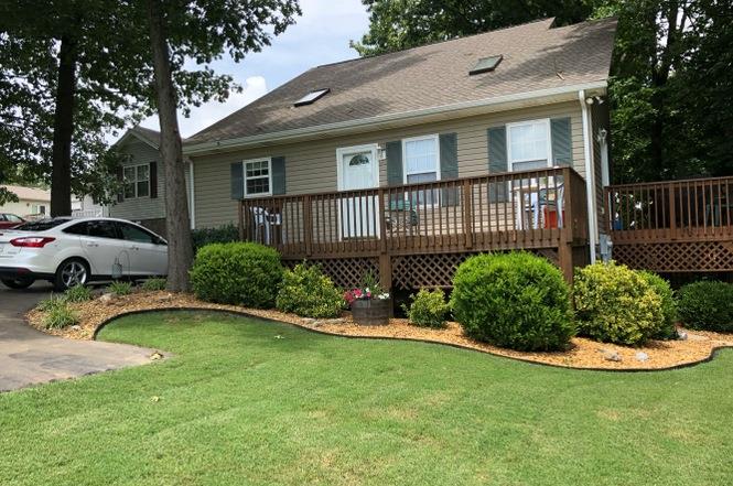 109 Brookside Point Springfield, TN 37172 - Photo 1 of 26 a view of a house with a garden and pathway