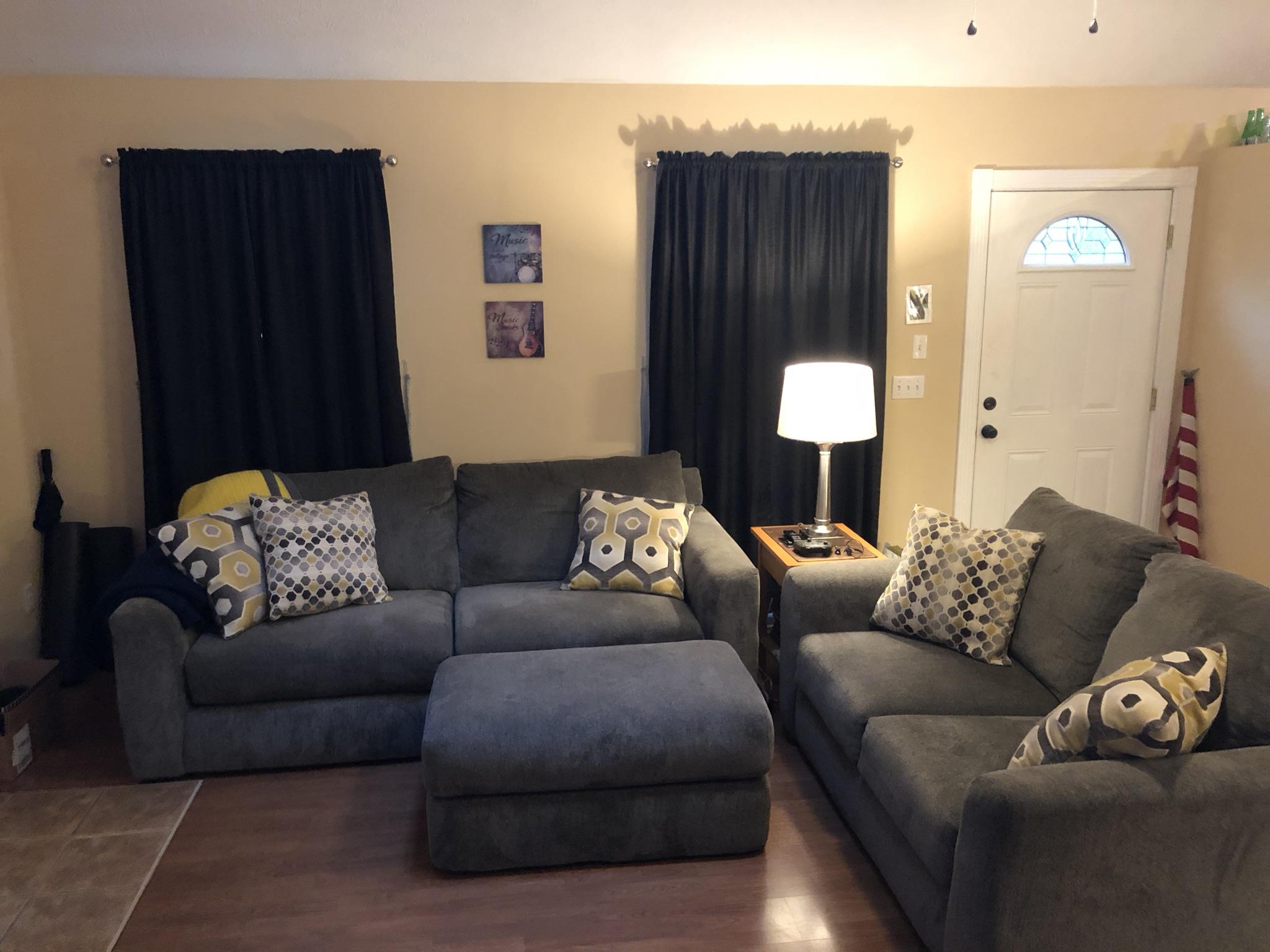109 Brookside Point Springfield, TN 37172 - Photo 4 of 26 a living room with furniture and a lamp