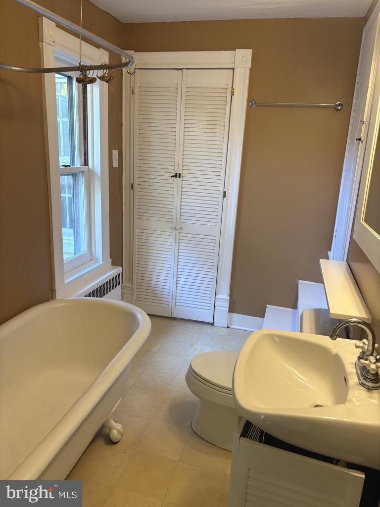 121 East 4th Street Frederick, MD 21701 - Photo 13 of 21 a bathroom with a tub and sink