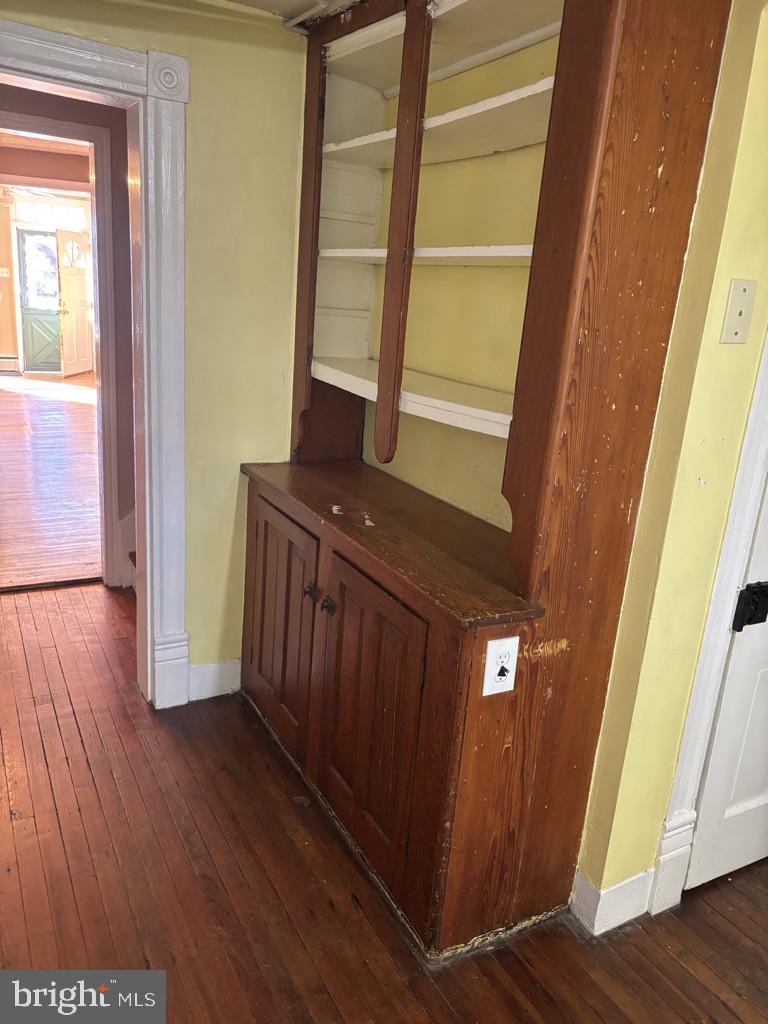 121 East 4th Street Frederick, MD 21701 - Photo 6 of 21 a view of a hallway with wooden floor