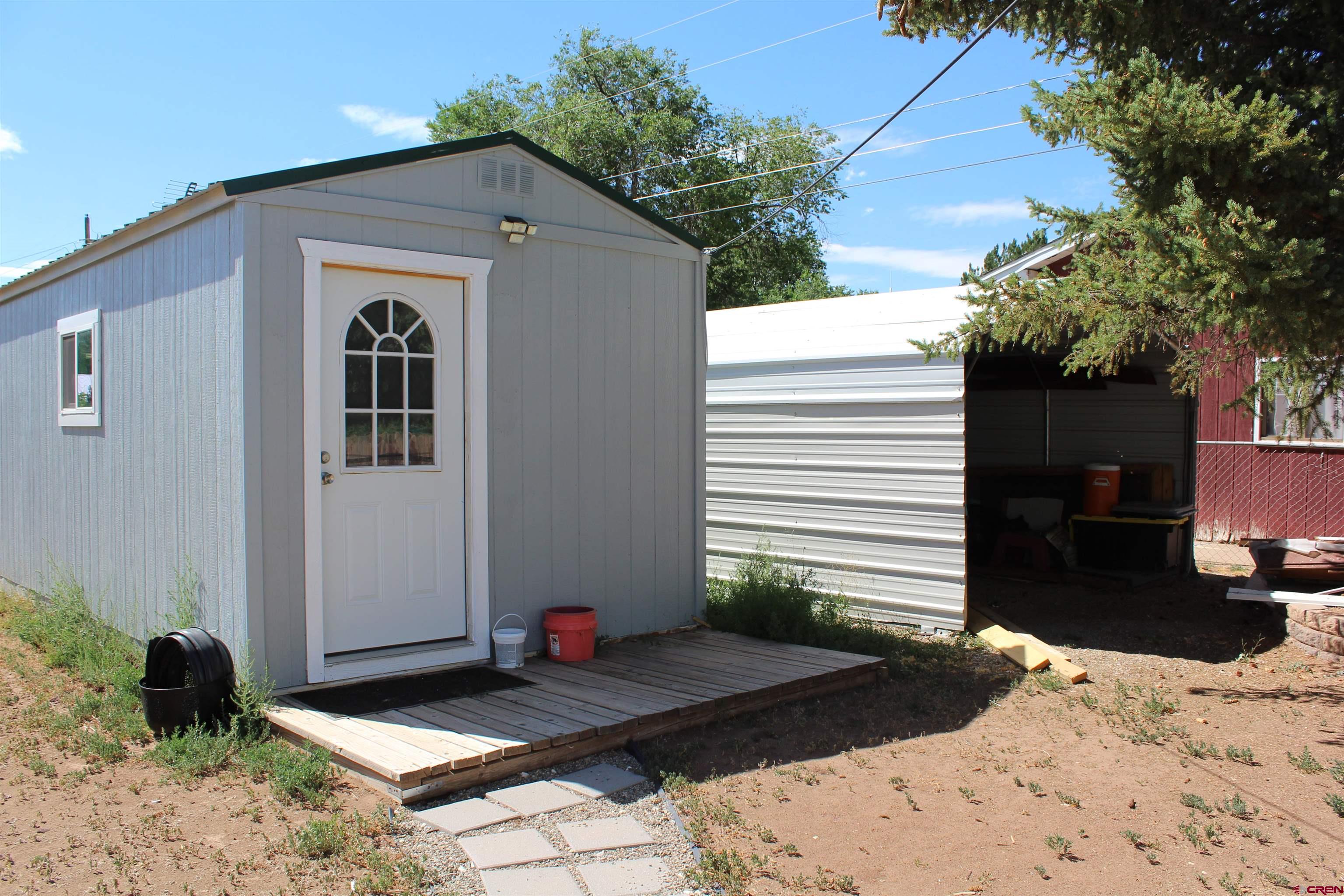 1702 East MacArthur Avenue Cortez, CO 81321 - Photo 36 of 42 a front view of a house