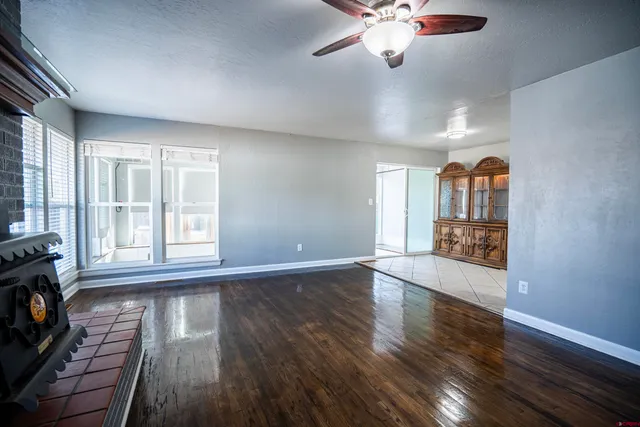 a view of empty room with windows