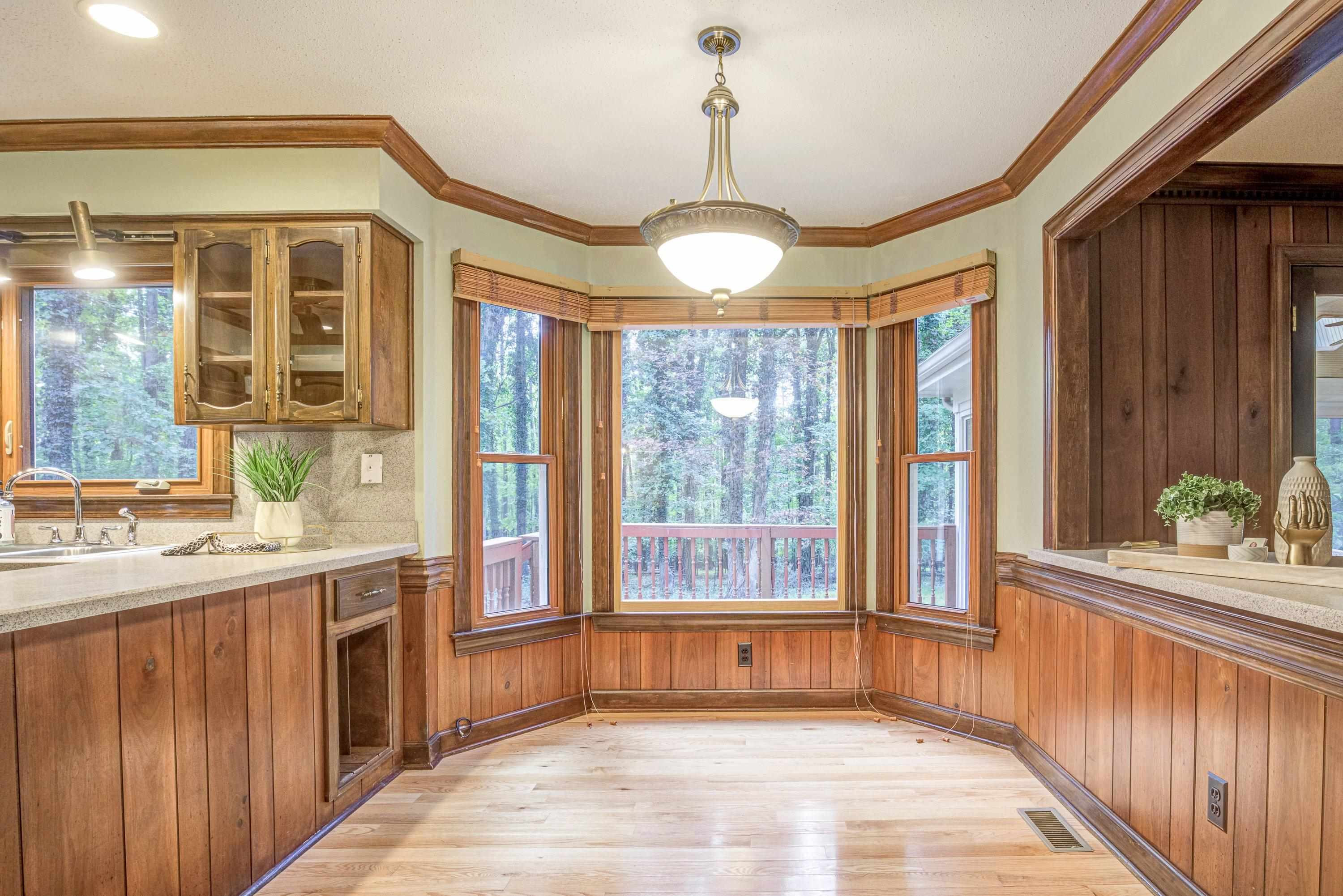 10213 Bushveld Lane Raleigh, NC 27613 - Photo 18 of 62 a view of a kitchen with a sink and windows