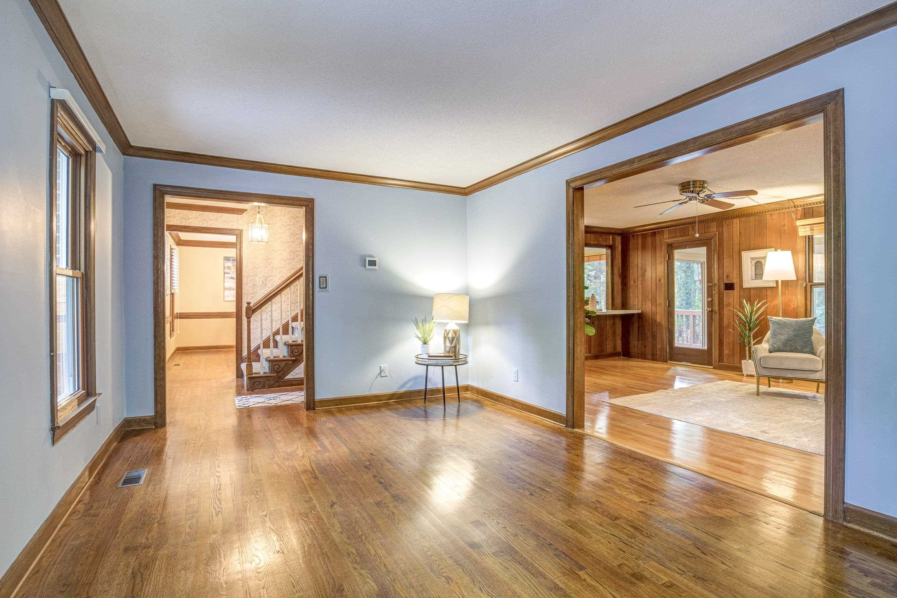 10213 Bushveld Lane Raleigh, NC 27613 - Photo 29 of 62 a view of empty room with wooden floor and fan
