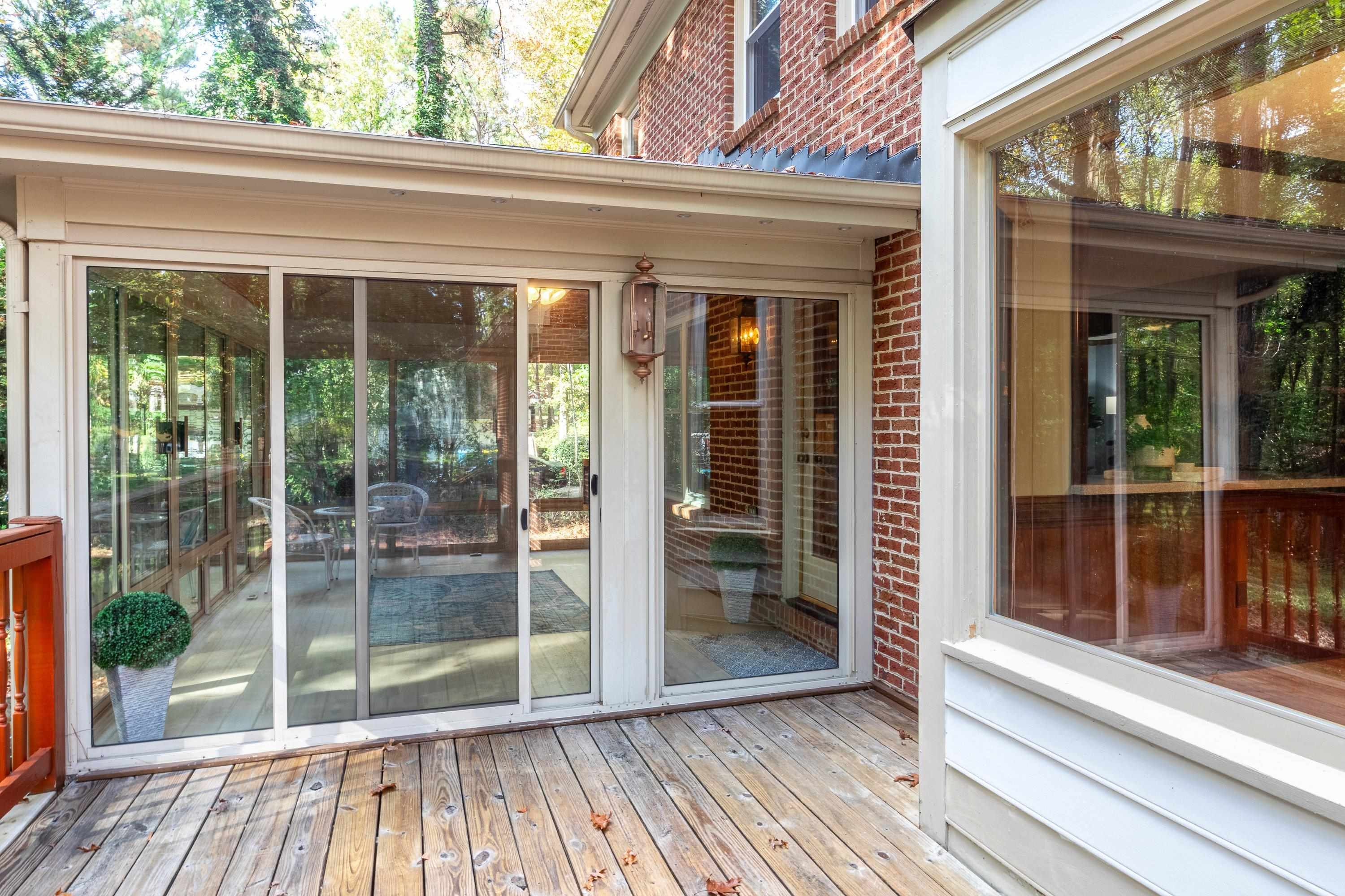 10213 Bushveld Lane Raleigh, NC 27613 - Photo 46 of 62 a view of a house with a glass door
