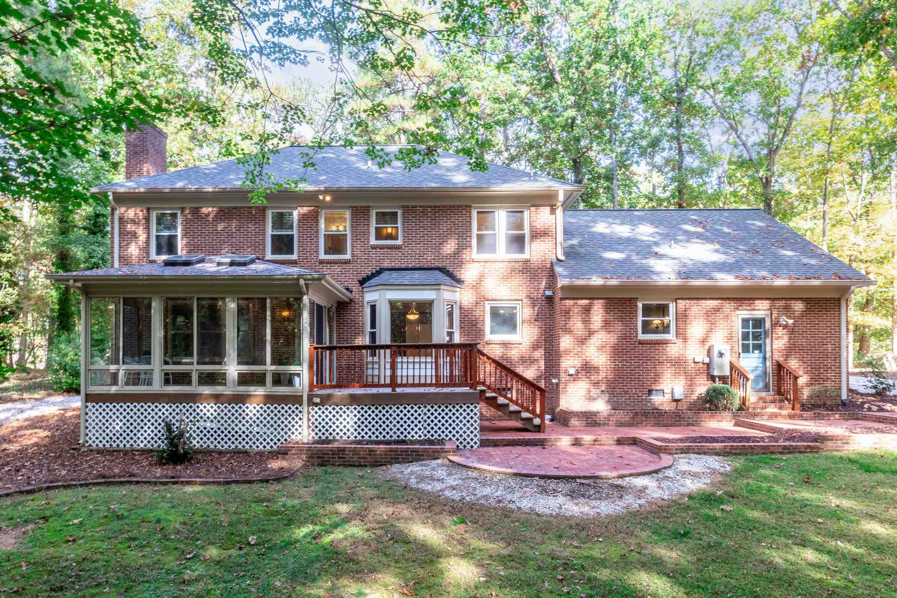 10213 Bushveld Lane Raleigh, NC 27613 - Photo 49 of 62 front view of a house with a yard