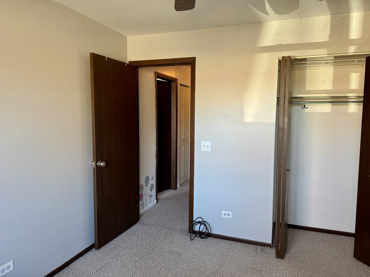 412 St Johns Road, Unit D Woodstock, IL 60098 - Photo 19 of 19 a view of a room with a refrigerator